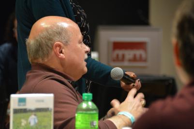 man talking into microphone