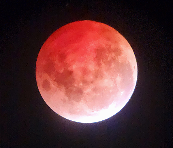 Photograph of near total lunar eclipse
