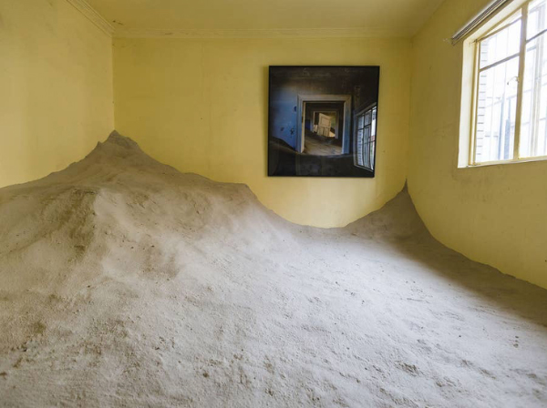 piles of sand in house
